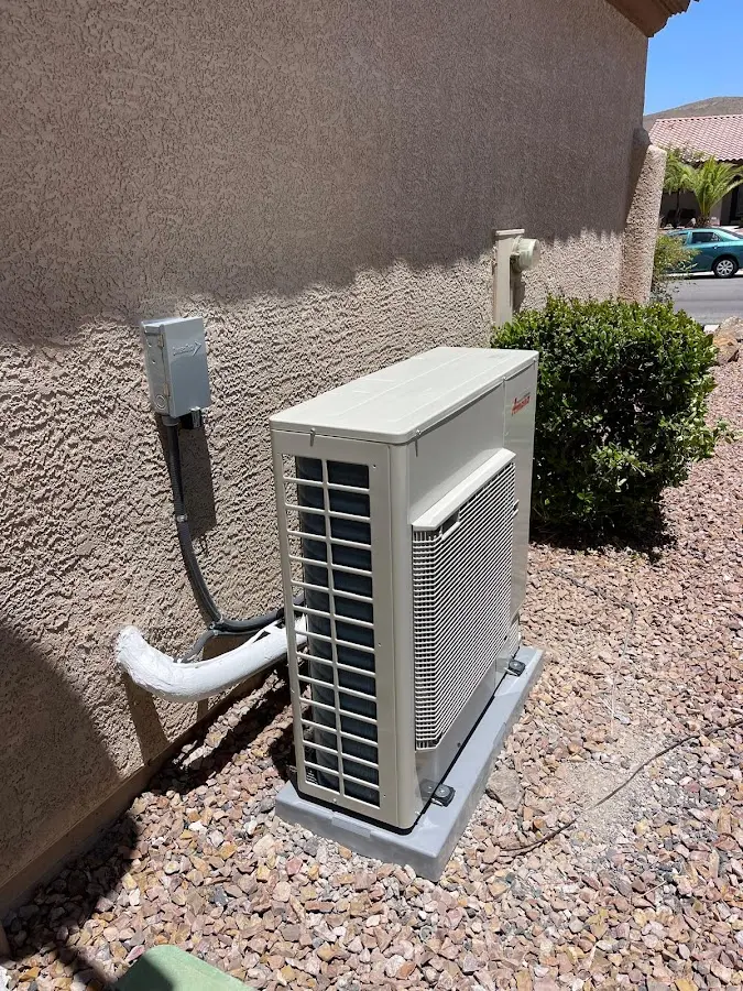 Residential air conditioning condenser unit in Cherryland